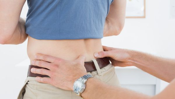 腰疼腹部坠疼怎么回事